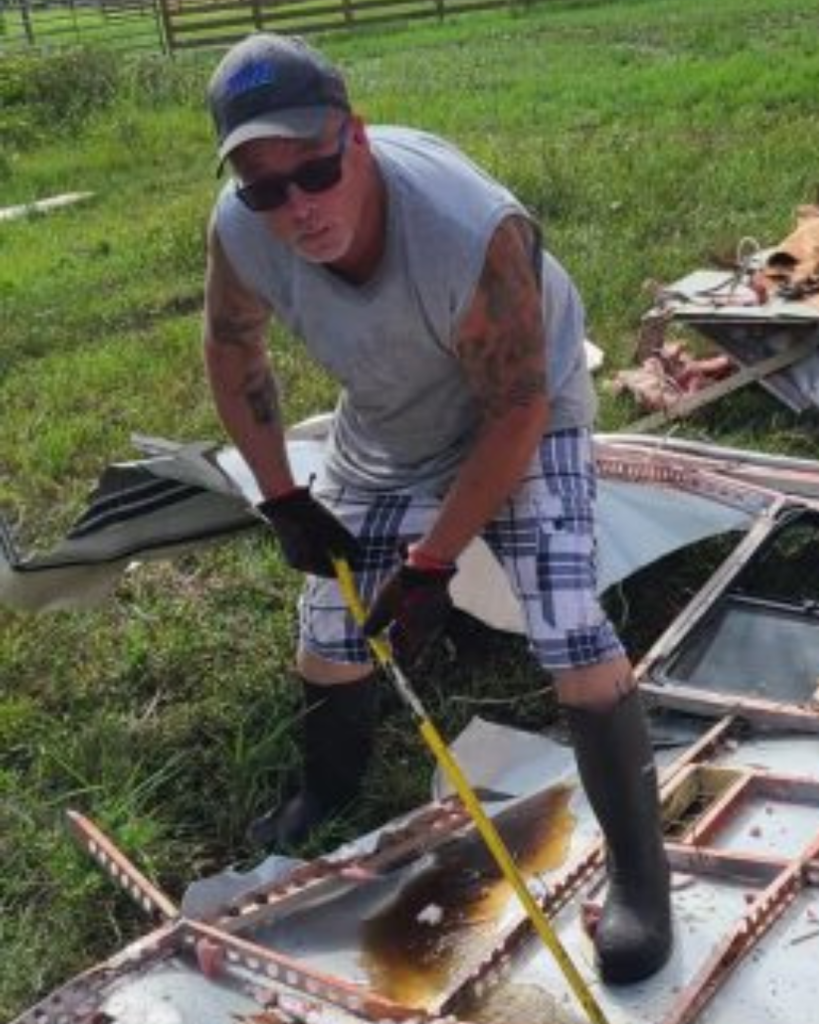 Mark Cass Owner of Florida Junk Removal Cutting Up a Mobile Home (1)